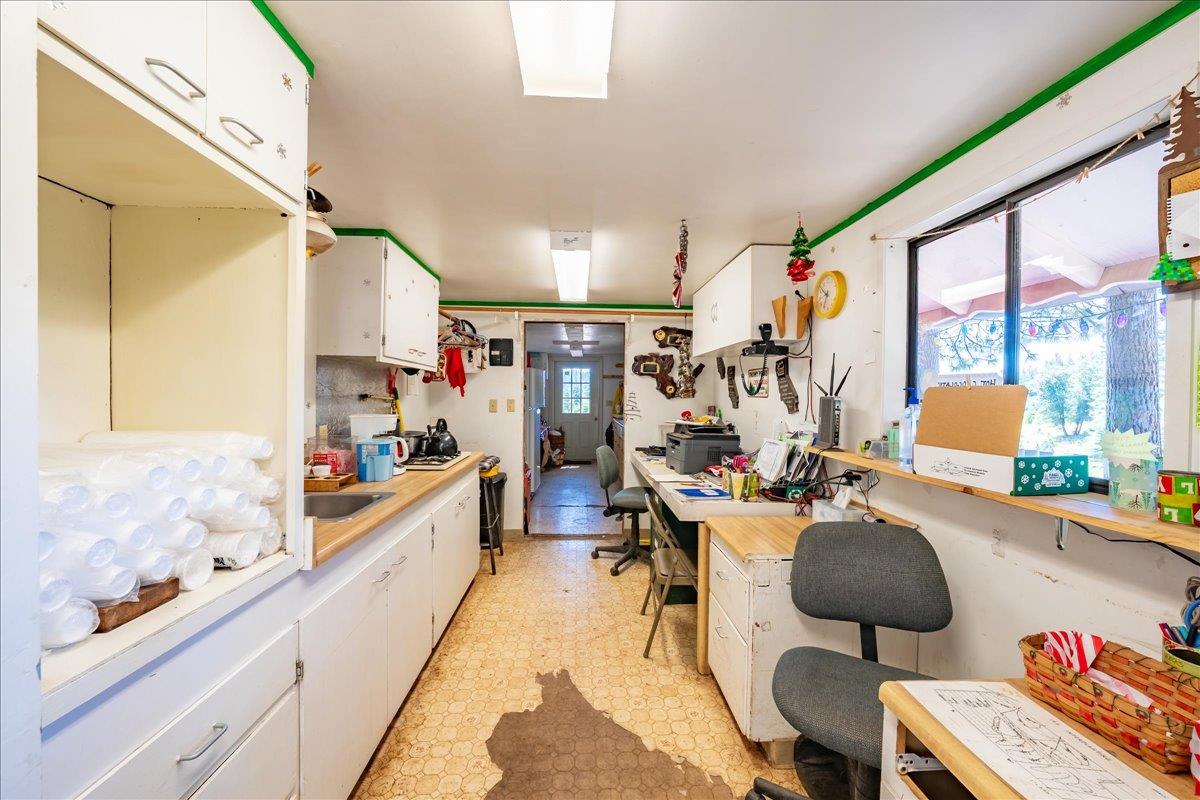 30100 Foresthill Road Foresthill, CA 95631 - Photo 8 of 89 a view of a kitchen with dining table and chairs