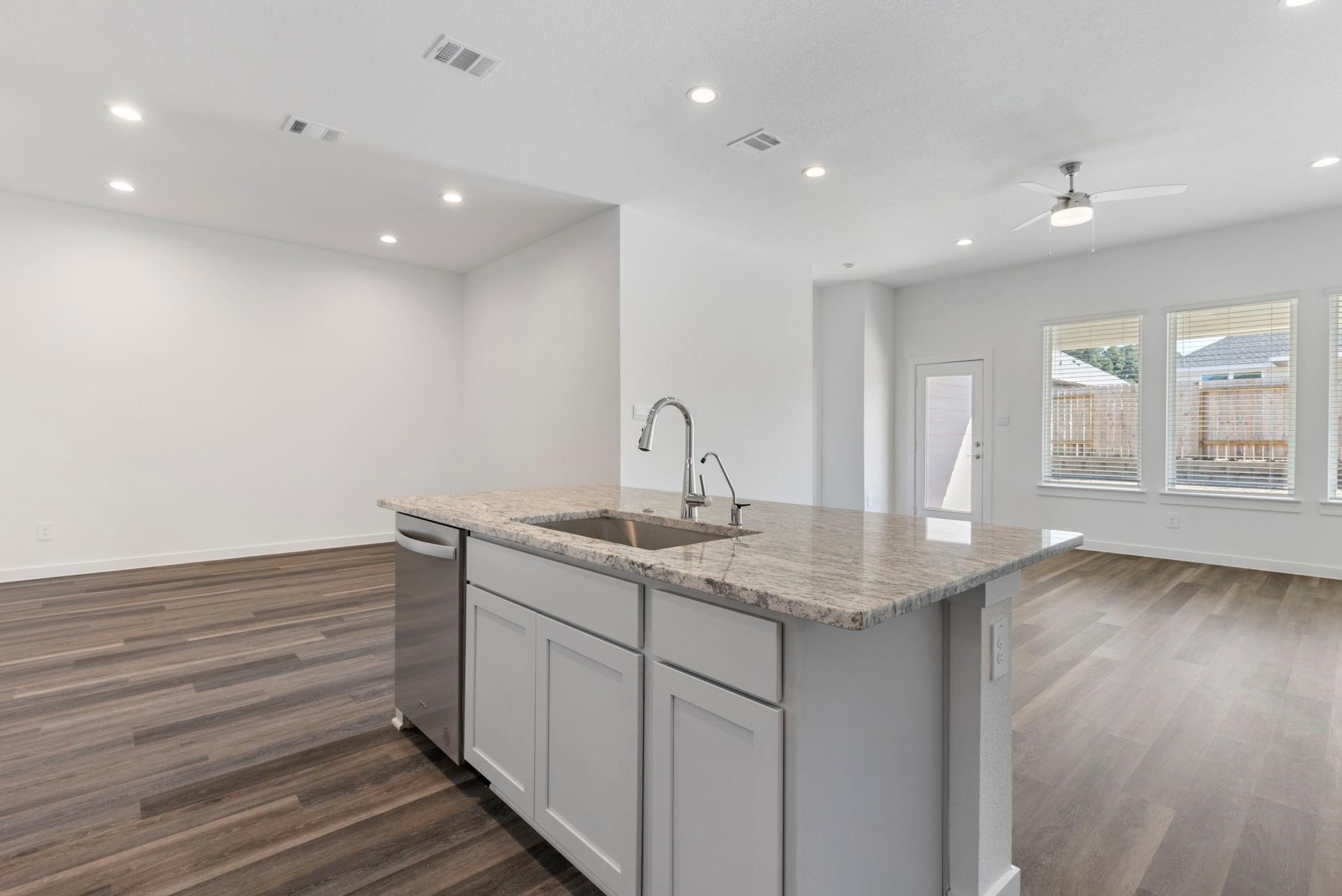 1644 Little Rabbit Court Montgomery, TX 77316 - Photo 12 of 27 a kitchen with sink and window