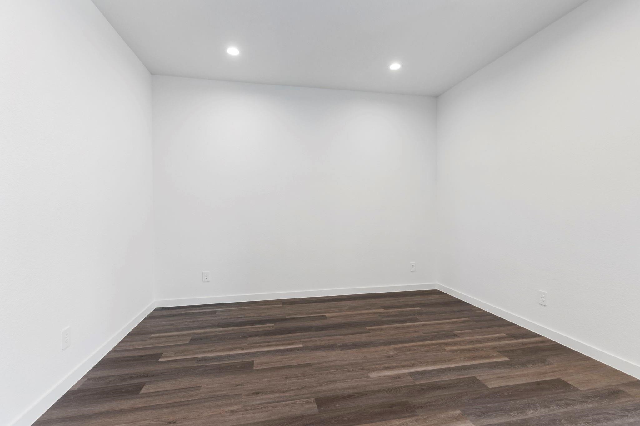 1644 Little Rabbit Court Montgomery, TX 77316 - Photo 17 of 27 a view of room with wooden floor and fan