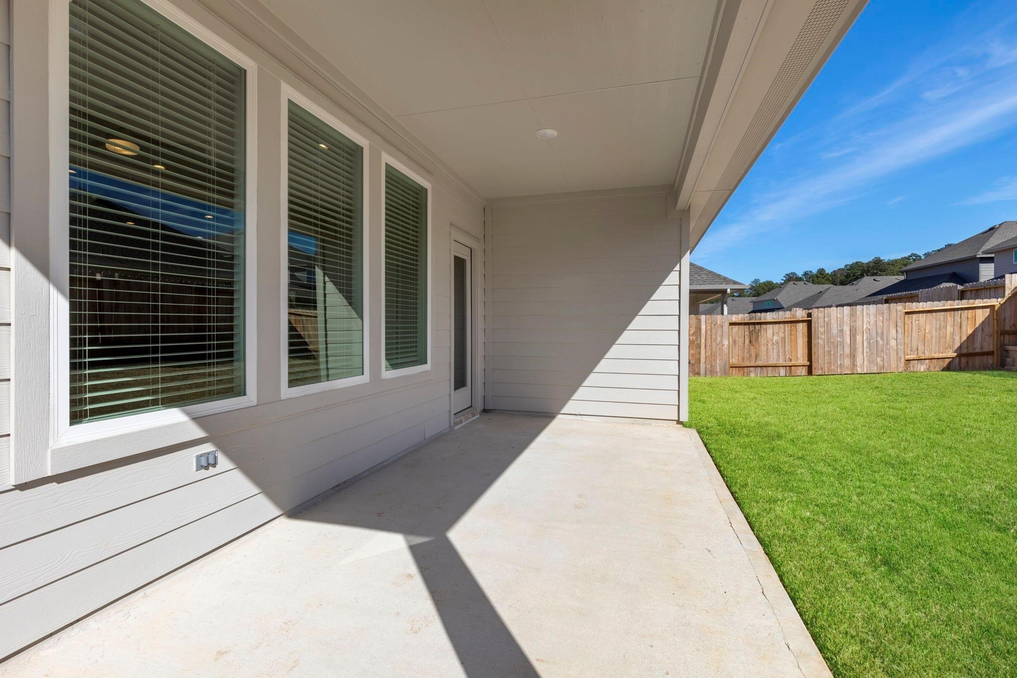 1644 Little Rabbit Court Montgomery, TX 77316 - Photo 3 of 27 a house view with a garden space