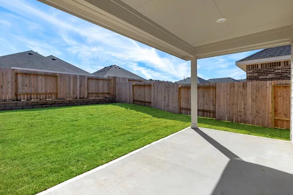 a view of a back yard of the house