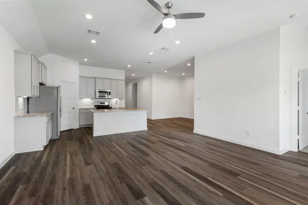 a view of kitchen with wooden floor