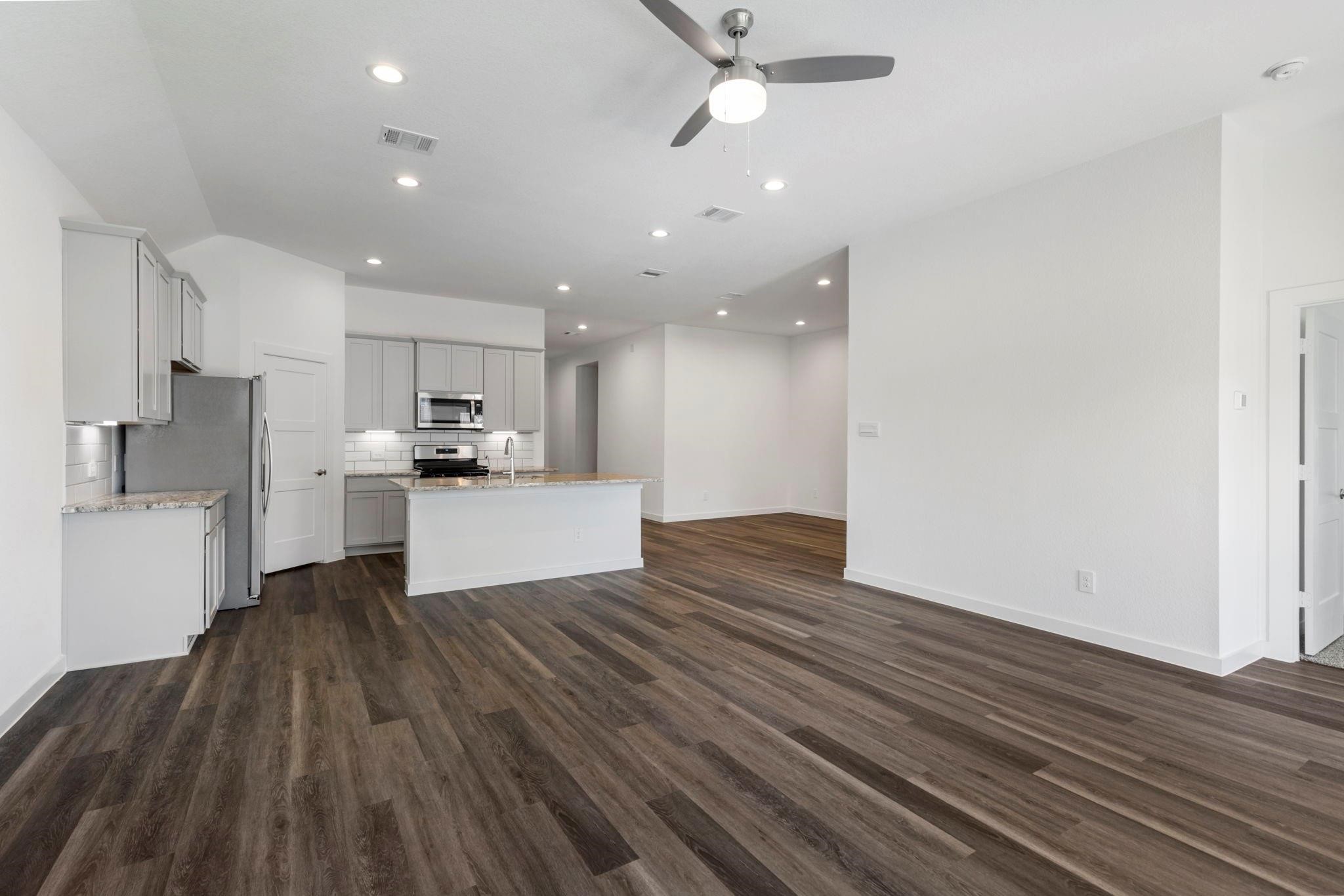 1644 Little Rabbit Court Montgomery, TX 77316 - Photo 10 of 27 a view of kitchen with wooden floor