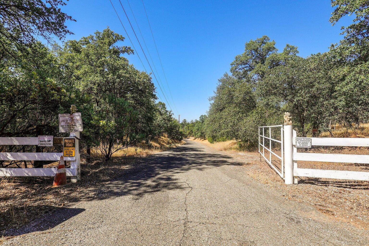Bernard Way Redding, CA 96003 - Photo 1 of 11 a view of a yard with wooden fence