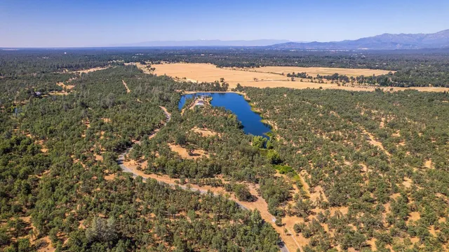 a view of an ocean and a mountain