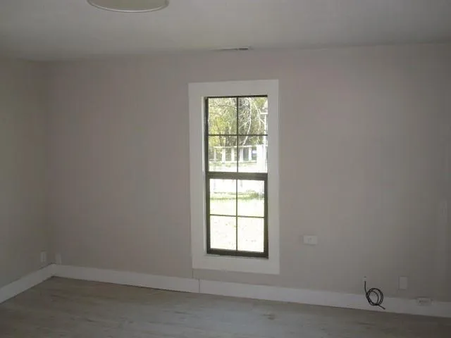 an empty room with a window