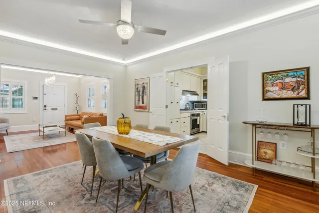 a view of a dining room with furniture