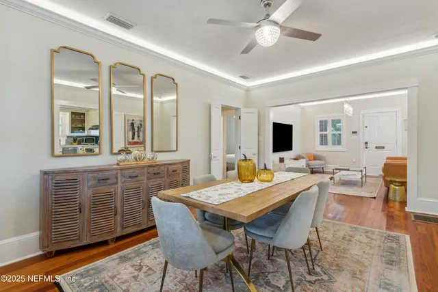 a view of a dining room with furniture