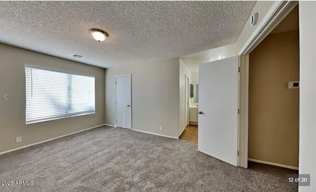 a view of an empty room with window