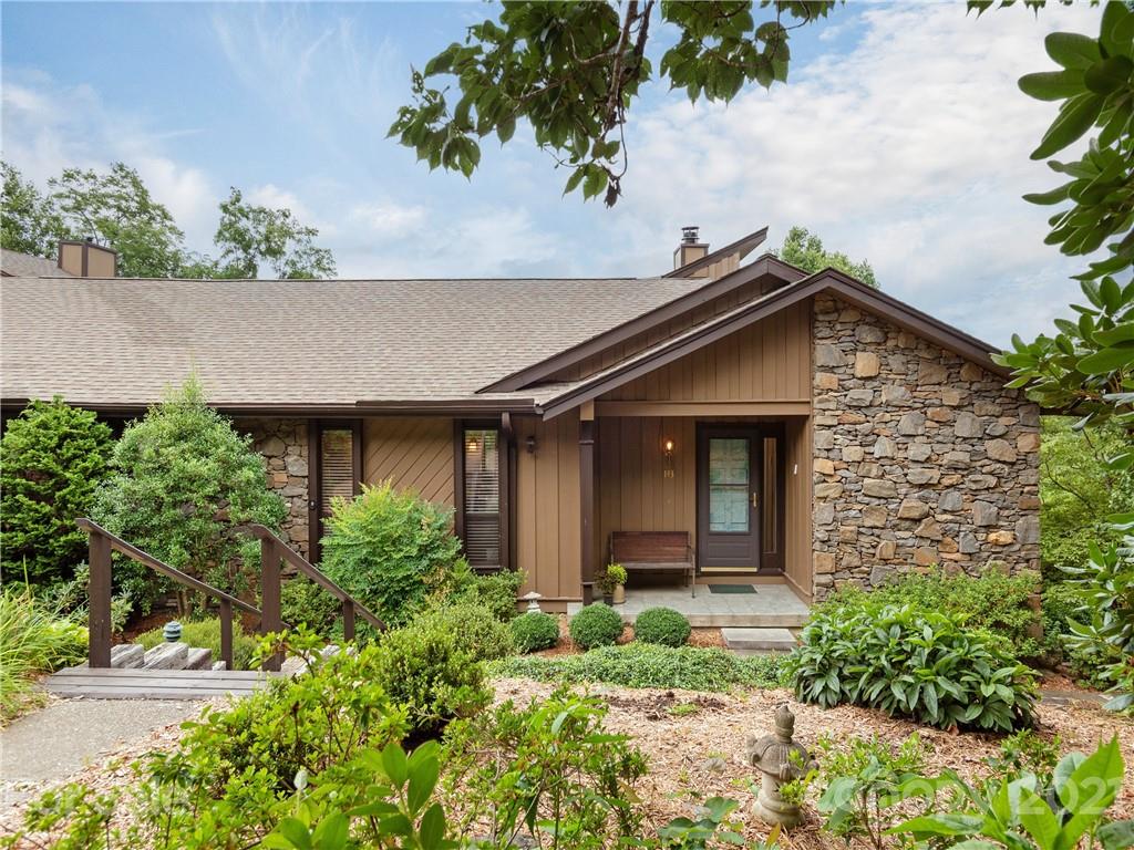 143 Country Ridge Road Hendersonville, NC 28739 - Photo 2 of 29 front view of house with potted plants
