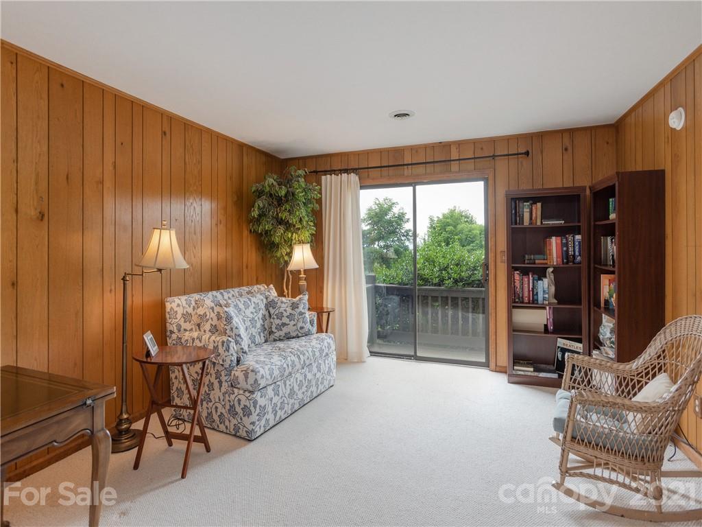 143 Country Ridge Road Hendersonville, NC 28739 - Photo 25 of 29 a living room with furniture and a window