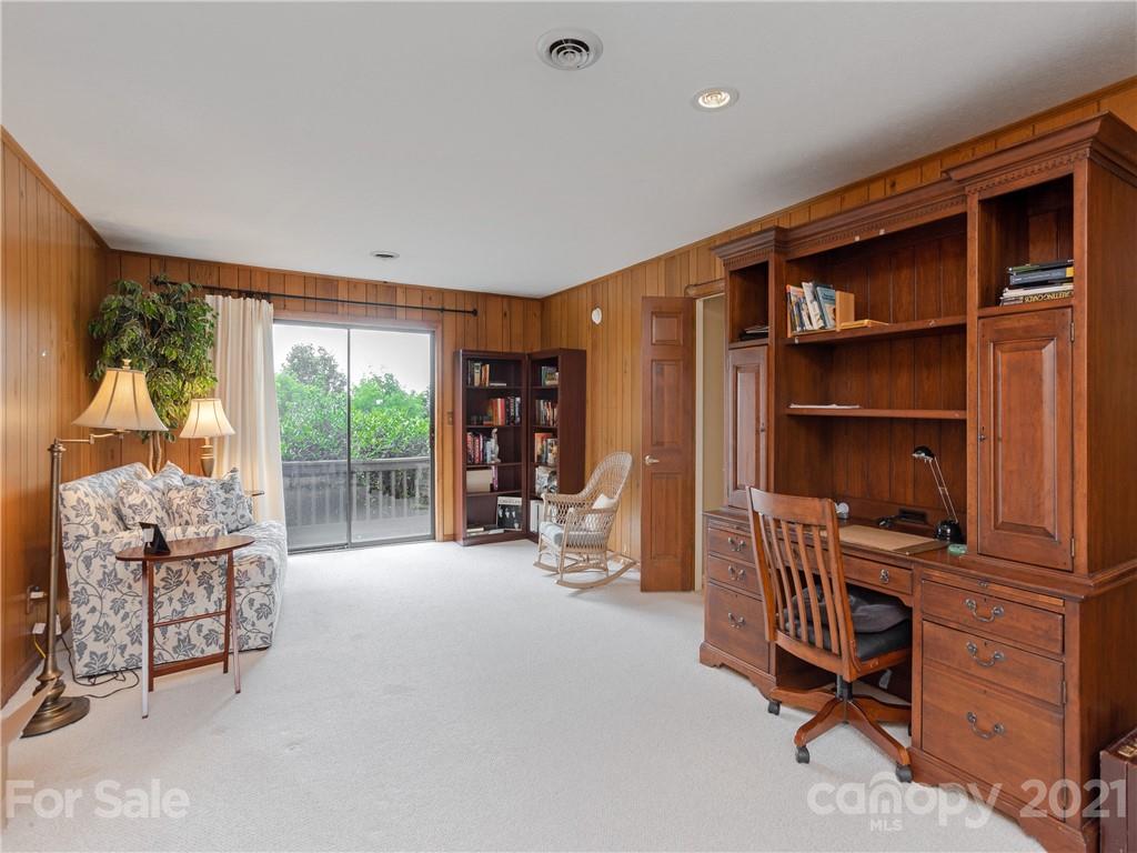 143 Country Ridge Road Hendersonville, NC 28739 - Photo 26 of 29 a bedroom with furniture and a window