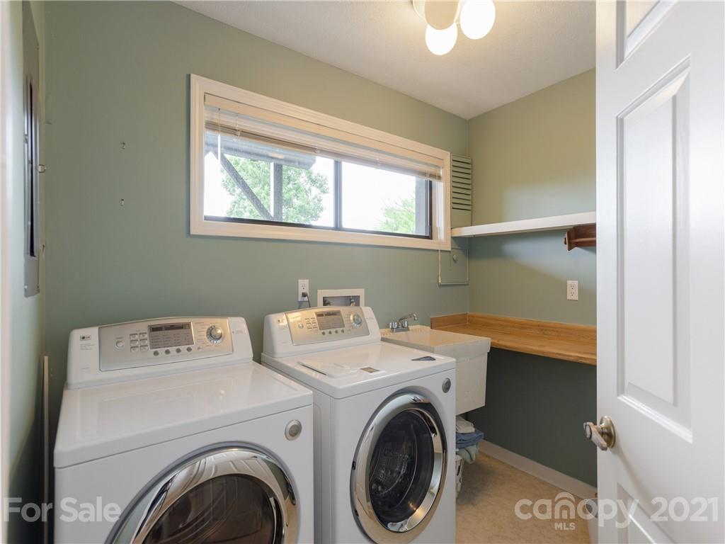 143 Country Ridge Road Hendersonville, NC 28739 - Photo 29 of 29 a utility room with dryer and washer