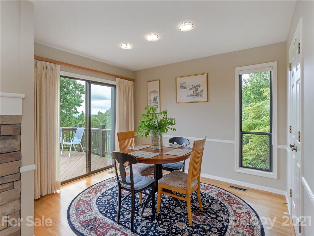 143 Country Ridge Road Hendersonville, NC 28739 - Photo 9 of 29 a dining room with furniture and window