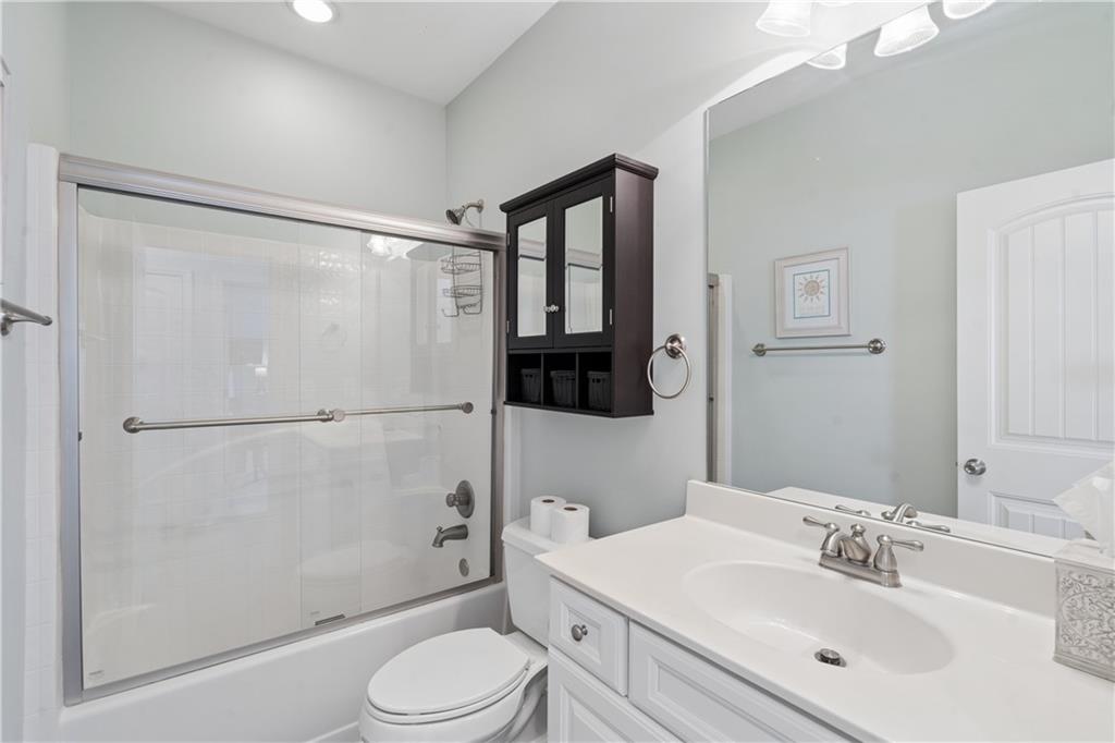2467 Allsborough Way Dacula, GA 30019 - Photo 29 of 45 a bathroom with a sink toilet and shower