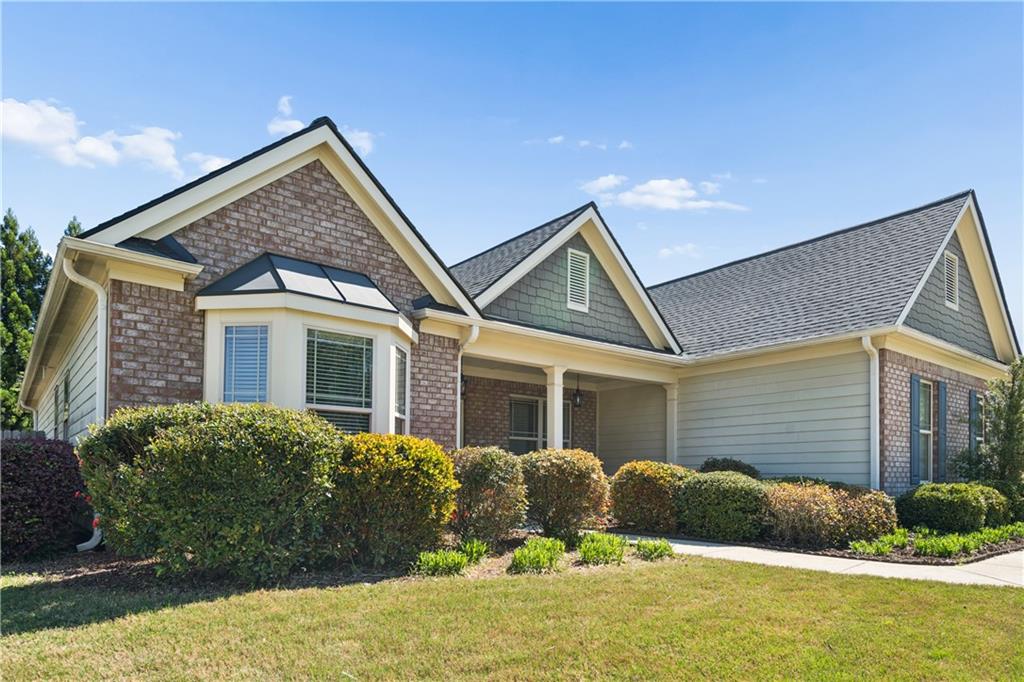 2467 Allsborough Way Dacula, GA 30019 - Photo 3 of 45 a front view of a house with a yard