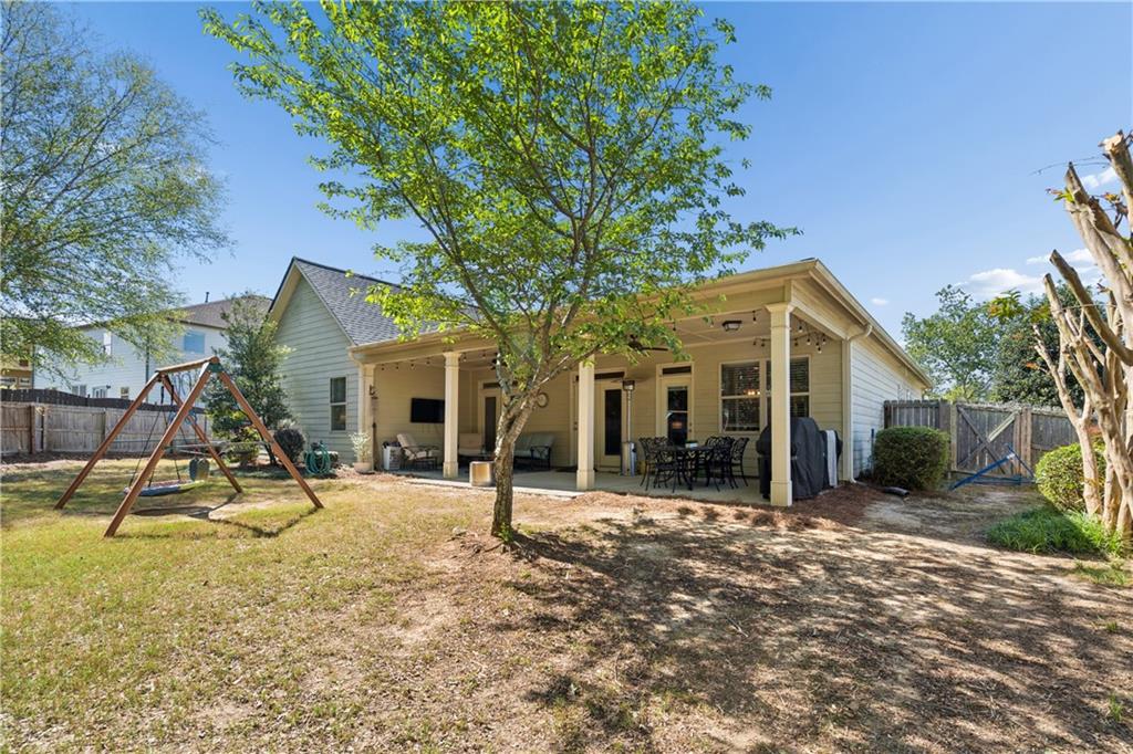 2467 Allsborough Way Dacula, GA 30019 - Photo 42 of 45 a view of a house with a patio