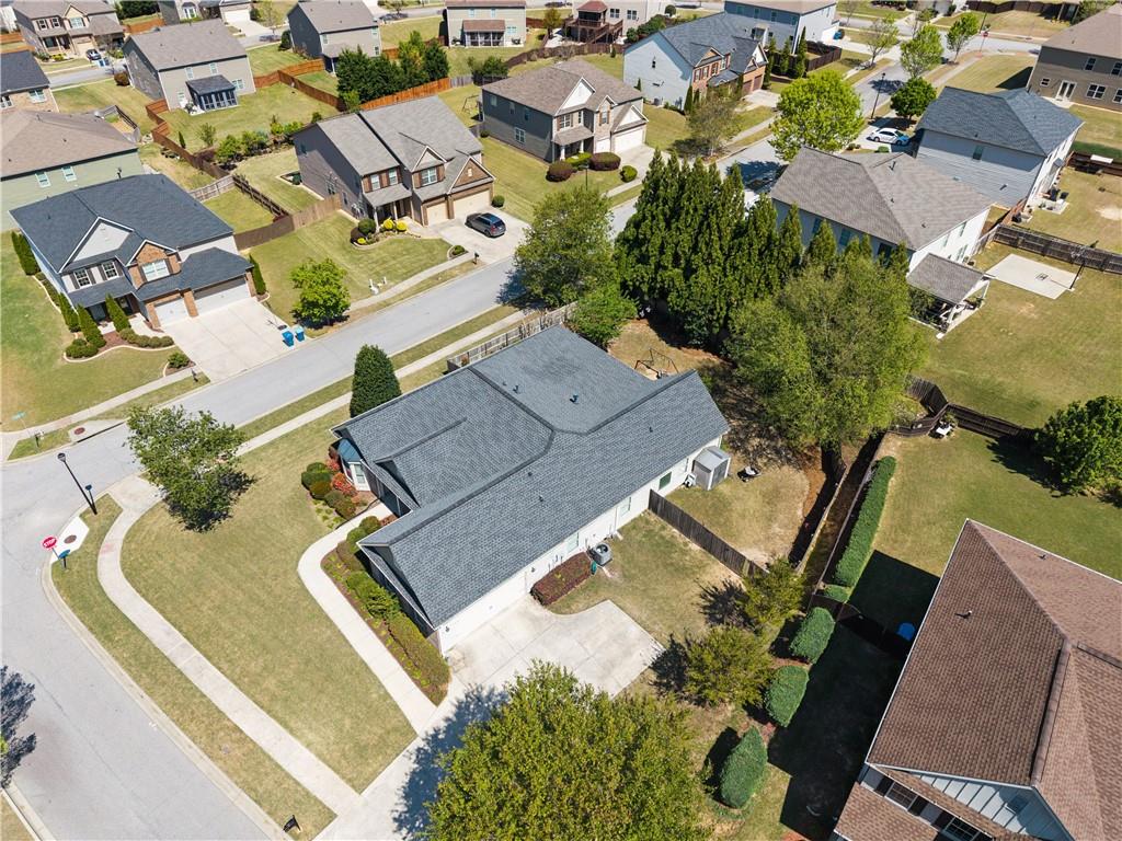 2467 Allsborough Way Dacula, GA 30019 - Photo 43 of 45 an aerial view of residential house with outdoor space and parking