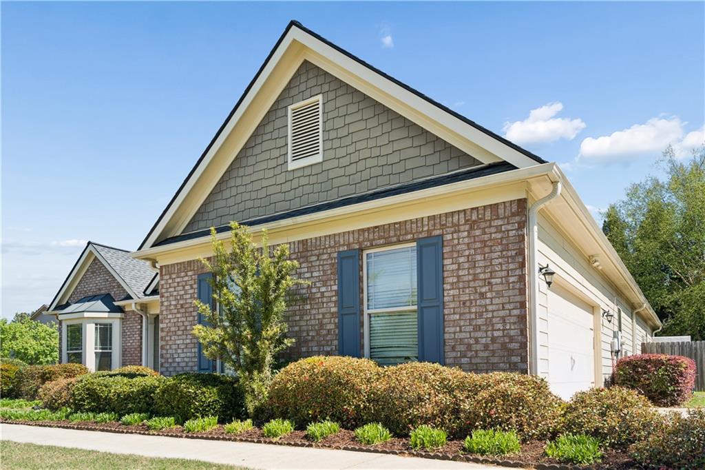 2467 Allsborough Way Dacula, GA 30019 - Photo 5 of 45 a front view of a house with a yard