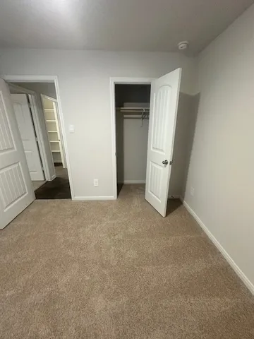 an empty room with a door