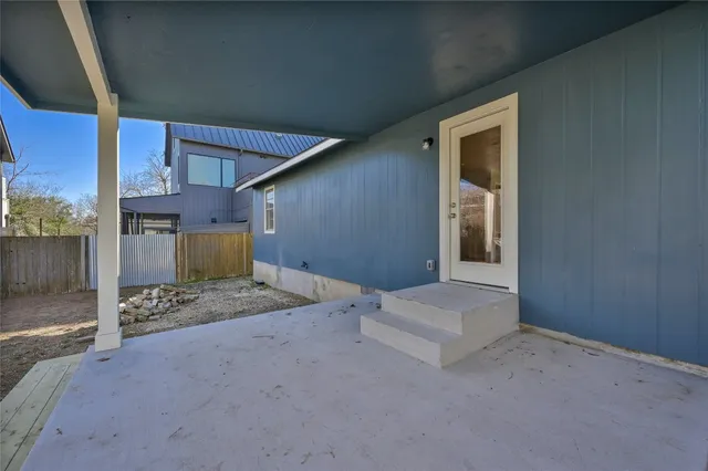 a view of a yard with a snow on the road