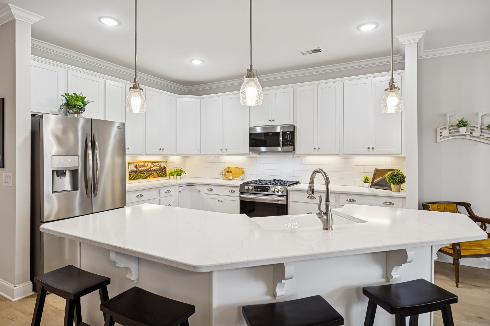 892 Meadow Crest Way Lebanon, TN 37090 - Photo 13 of 47 a kitchen with refrigerator and chairs