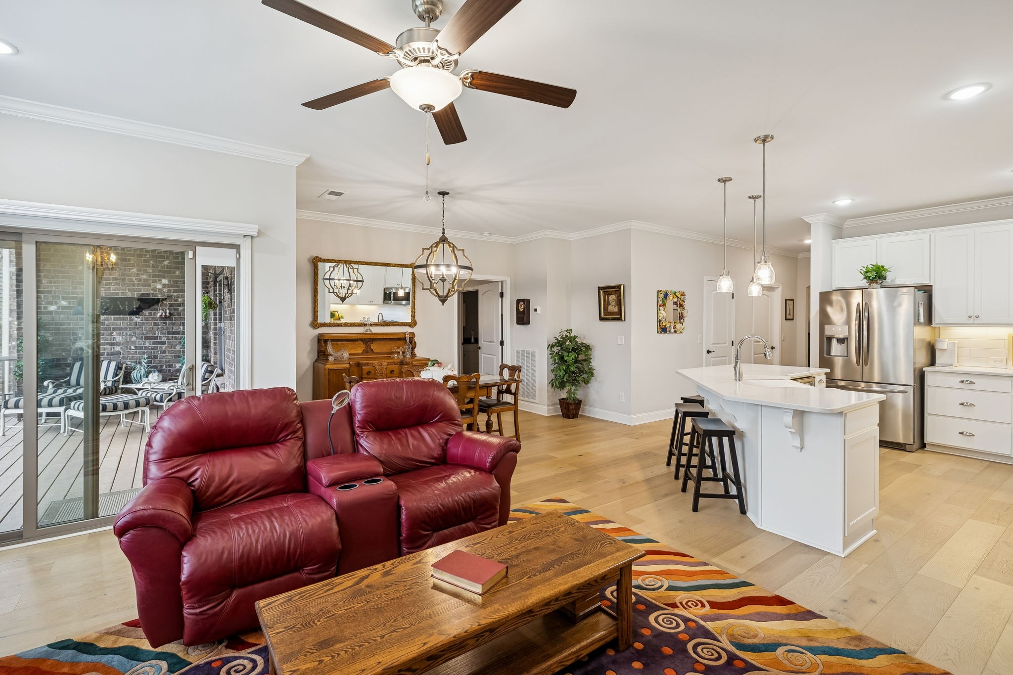 892 Meadow Crest Way Lebanon, TN 37090 - Photo 16 of 47 a living room with furniture a ceiling fan and a rug