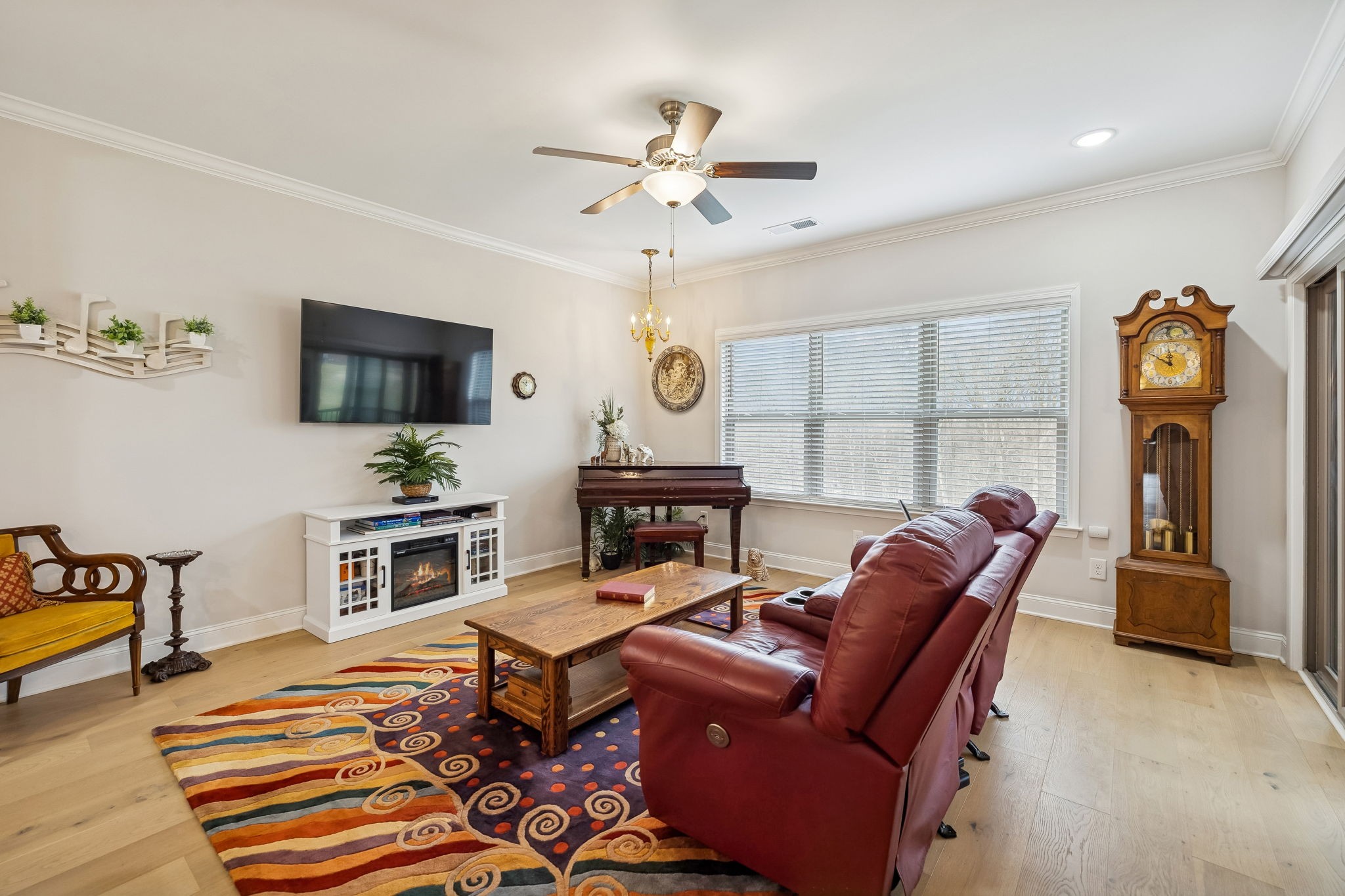 892 Meadow Crest Way Lebanon, TN 37090 - Photo 18 of 47 a living room with furniture a flat screen tv and kitchen view