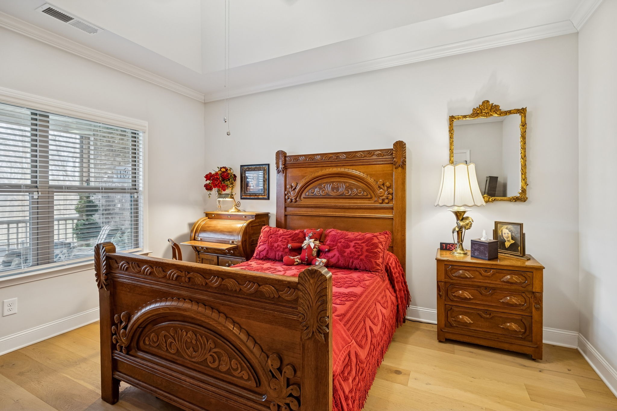 892 Meadow Crest Way Lebanon, TN 37090 - Photo 22 of 47 a bedroom with a bed and dresser