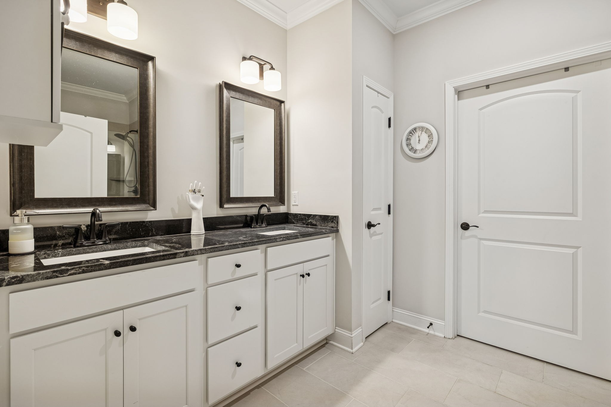 892 Meadow Crest Way Lebanon, TN 37090 - Photo 24 of 47 a bathroom with double sink and a mirror