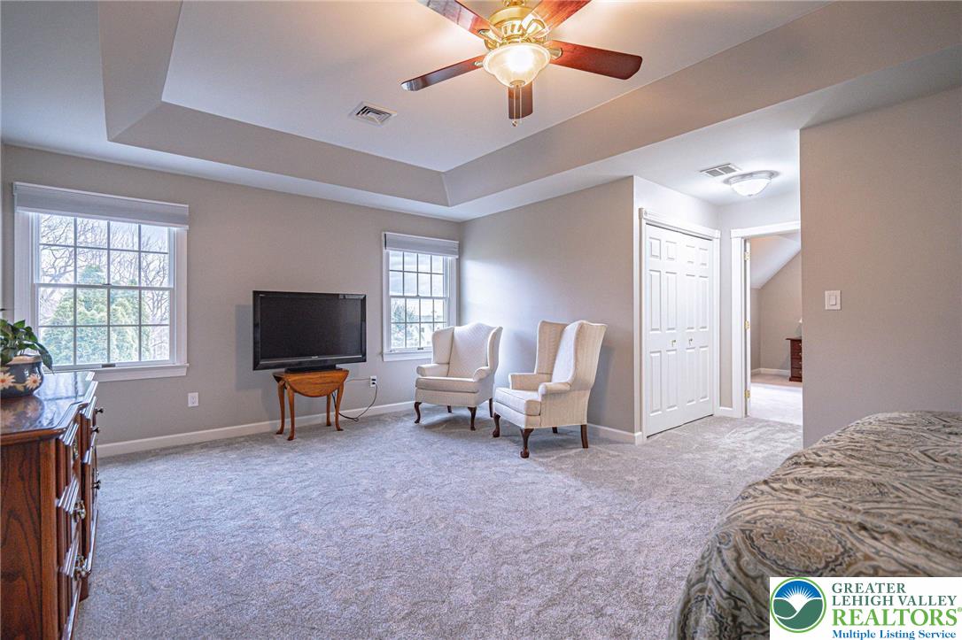 6551 Overlook Road Orefield, PA 18069 - Photo 39 of 82 a living room with furniture and a flat screen tv