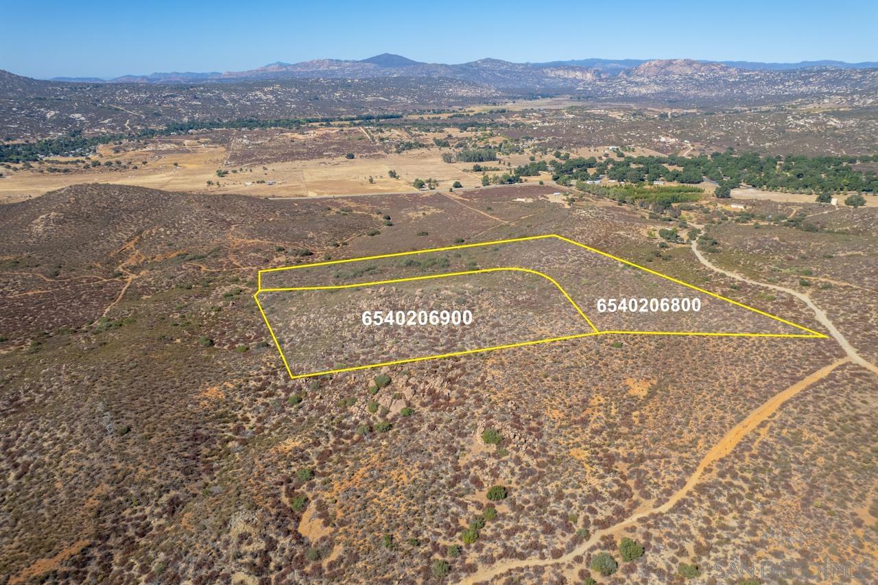 a view of an ocean and a mountain