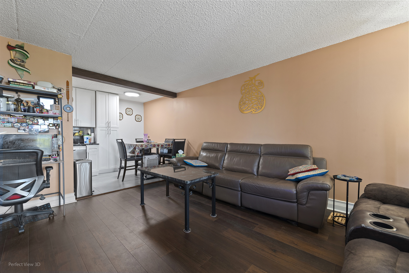 9701 North Dee Road, Unit 5E Niles, IL 60714 - Photo 12 of 18 a living room with furniture a fireplace and a flat screen tv