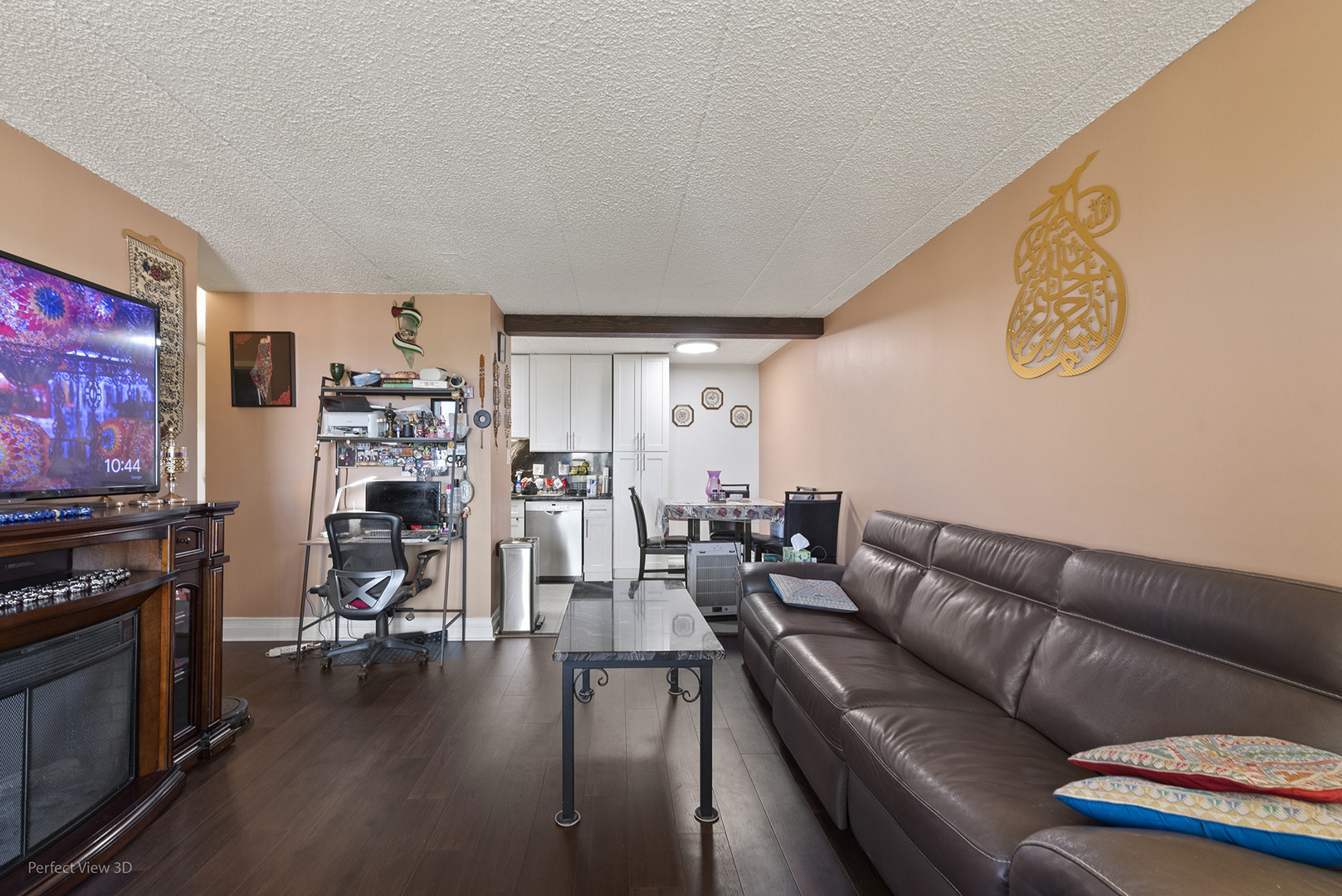 9701 North Dee Road, Unit 5E Niles, IL 60714 - Photo 13 of 18 a living room with furniture and a flat screen tv