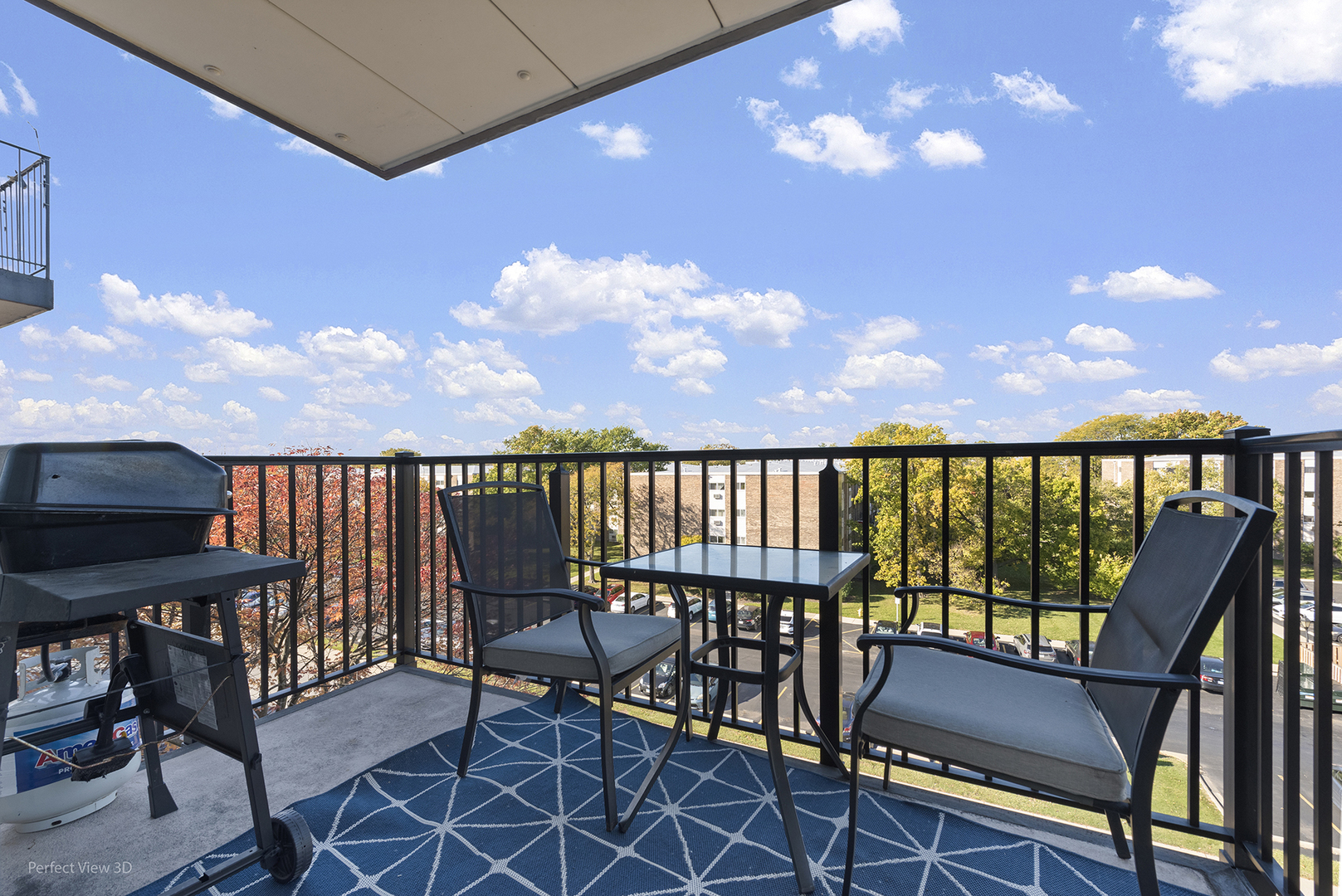 9701 North Dee Road, Unit 5E Niles, IL 60714 - Photo 14 of 18 a view of a balcony with furniture