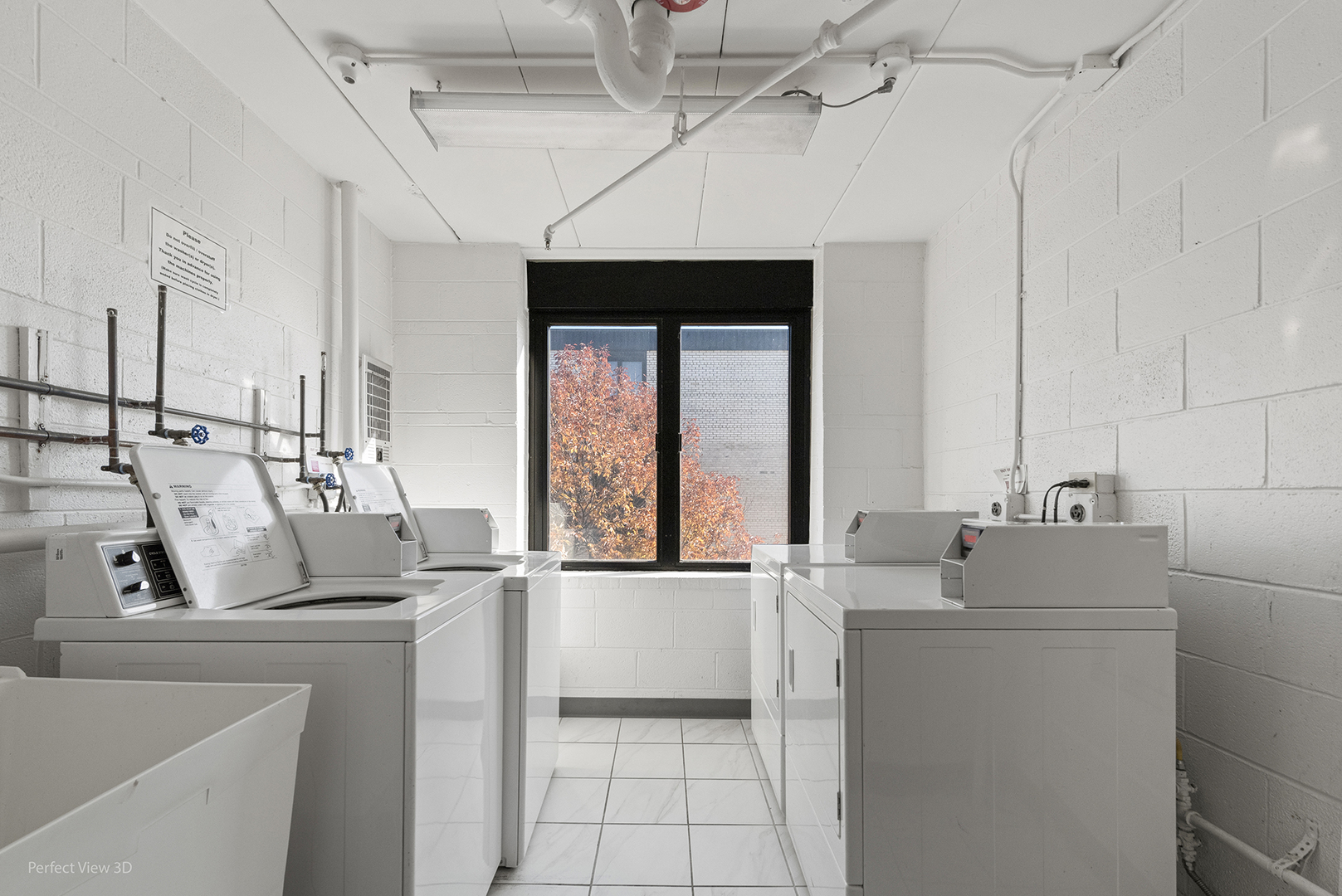 9701 North Dee Road, Unit 5E Niles, IL 60714 - Photo 15 of 18 a utility room with dryer and washer