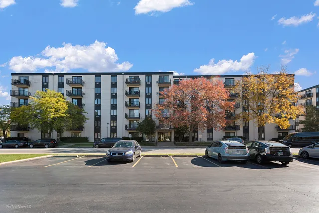 a view of a cars parked in front of a building