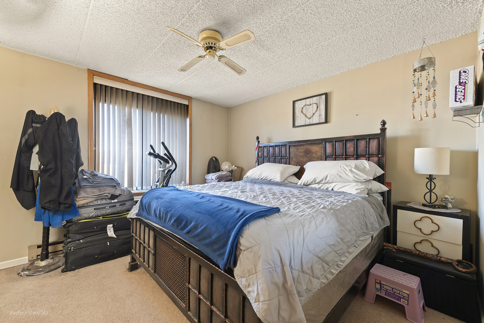 9701 North Dee Road, Unit 5E Niles, IL 60714 - Photo 6 of 18 a bedroom with a bed and a chandelier
