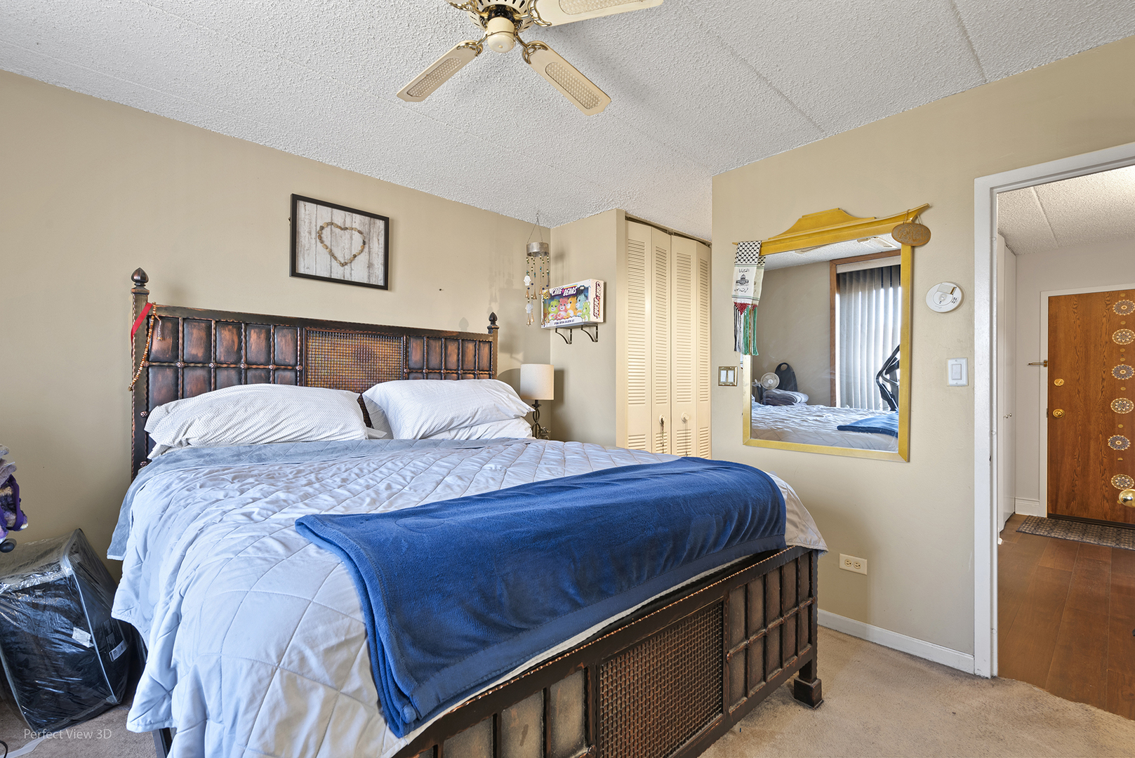9701 North Dee Road, Unit 5E Niles, IL 60714 - Photo 7 of 18 a bedroom with a bed and a chandelier