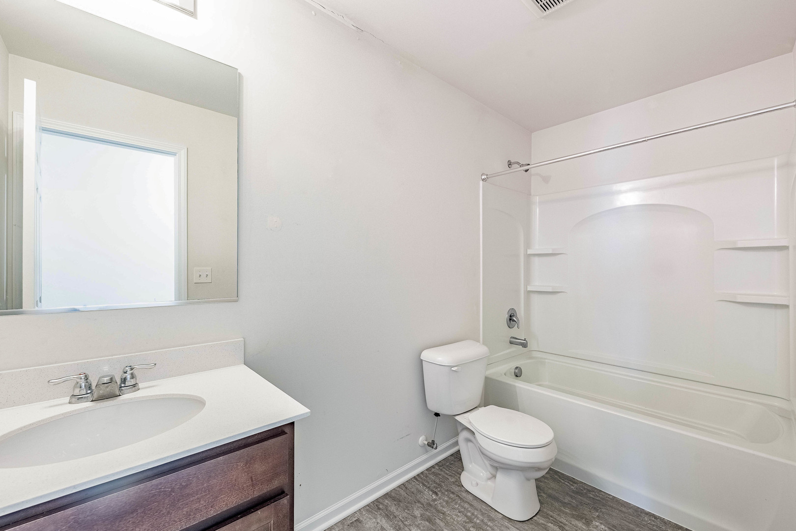 1019 Freeman Street Plano, IL 60545 - Photo 26 of 28 a bathroom with a sink toilet and shower