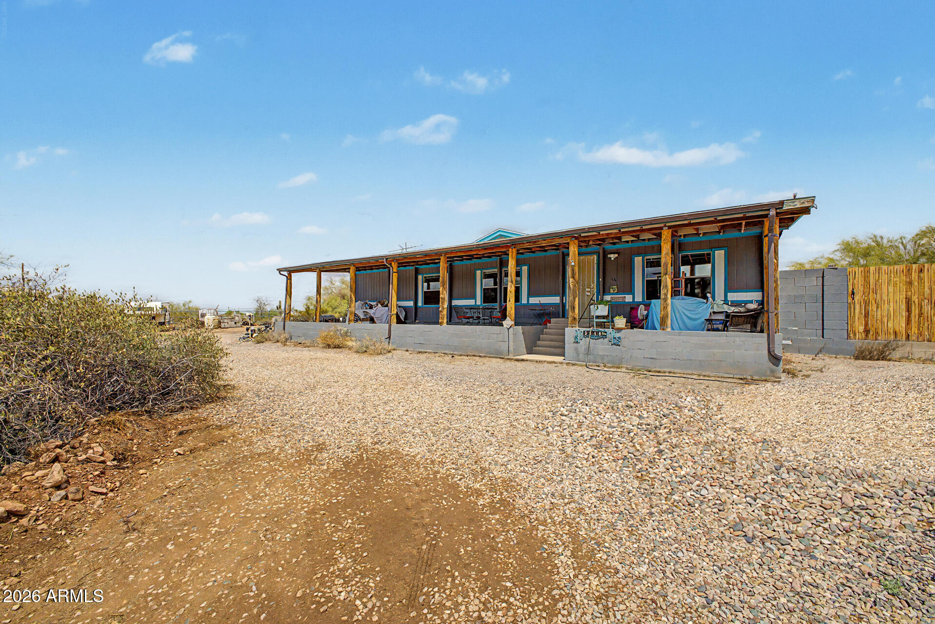 2548 South Val Vista Road Apache Junction, AZ 85119 - Photo 10 of 29 front view of a house with a patio