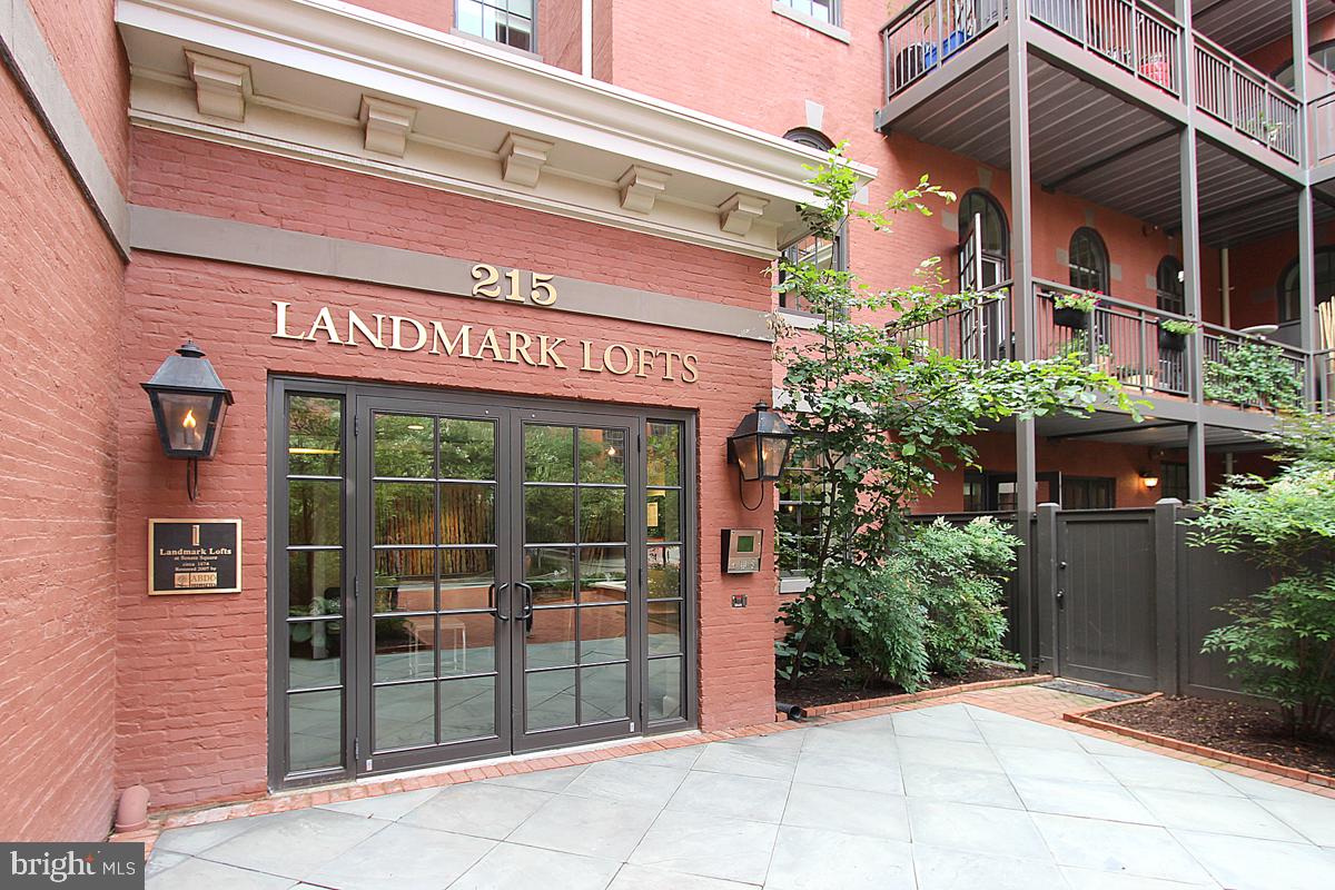 215 I Street Northeast, Unit 111 Washington, DC 20002 - Photo 3 of 34 a view of a building with potted plants