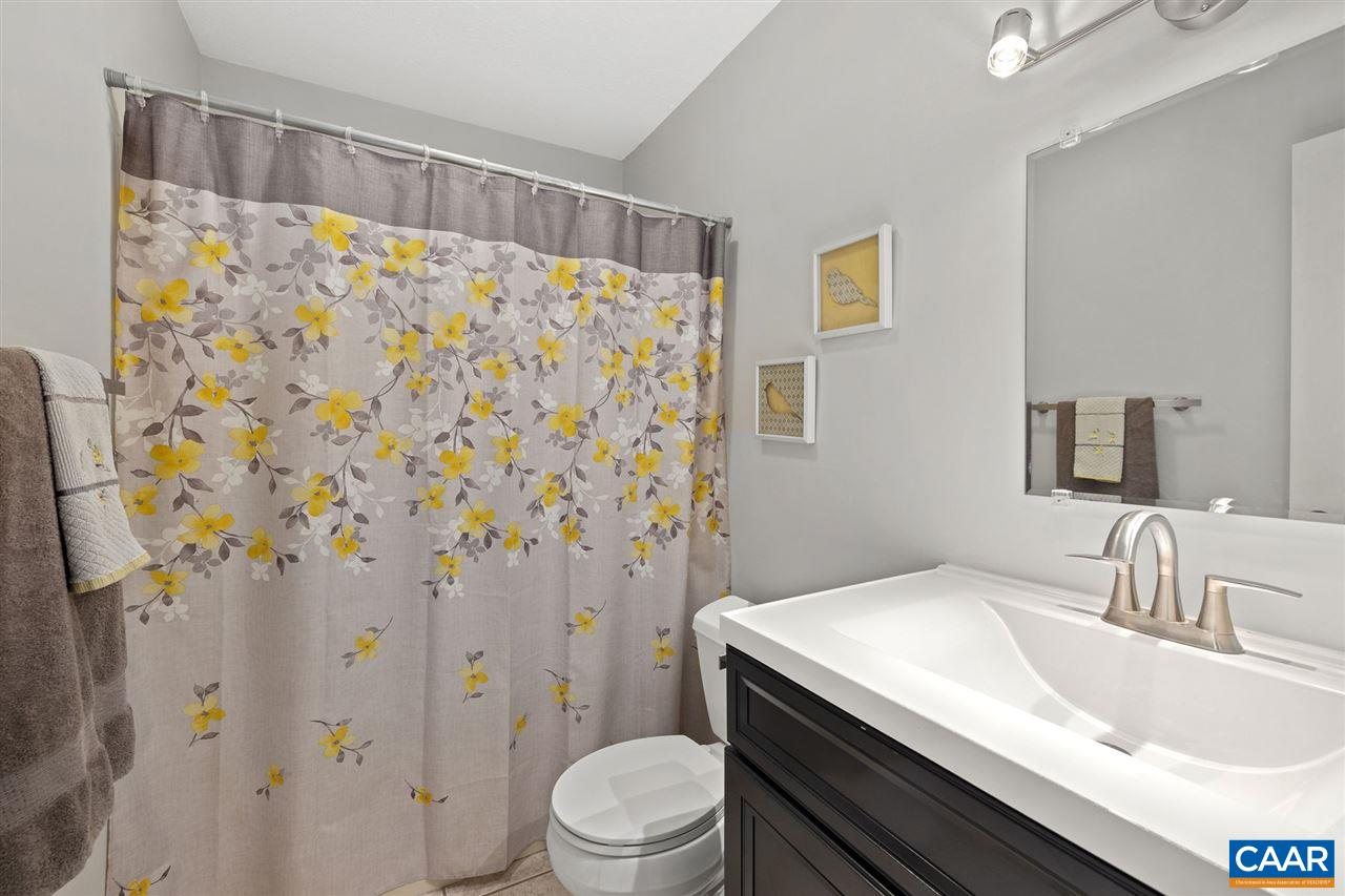 949 Chapman Road Stanardsville, VA 22973 - Photo 16 of 41 a bathroom with a sink toilet and shower