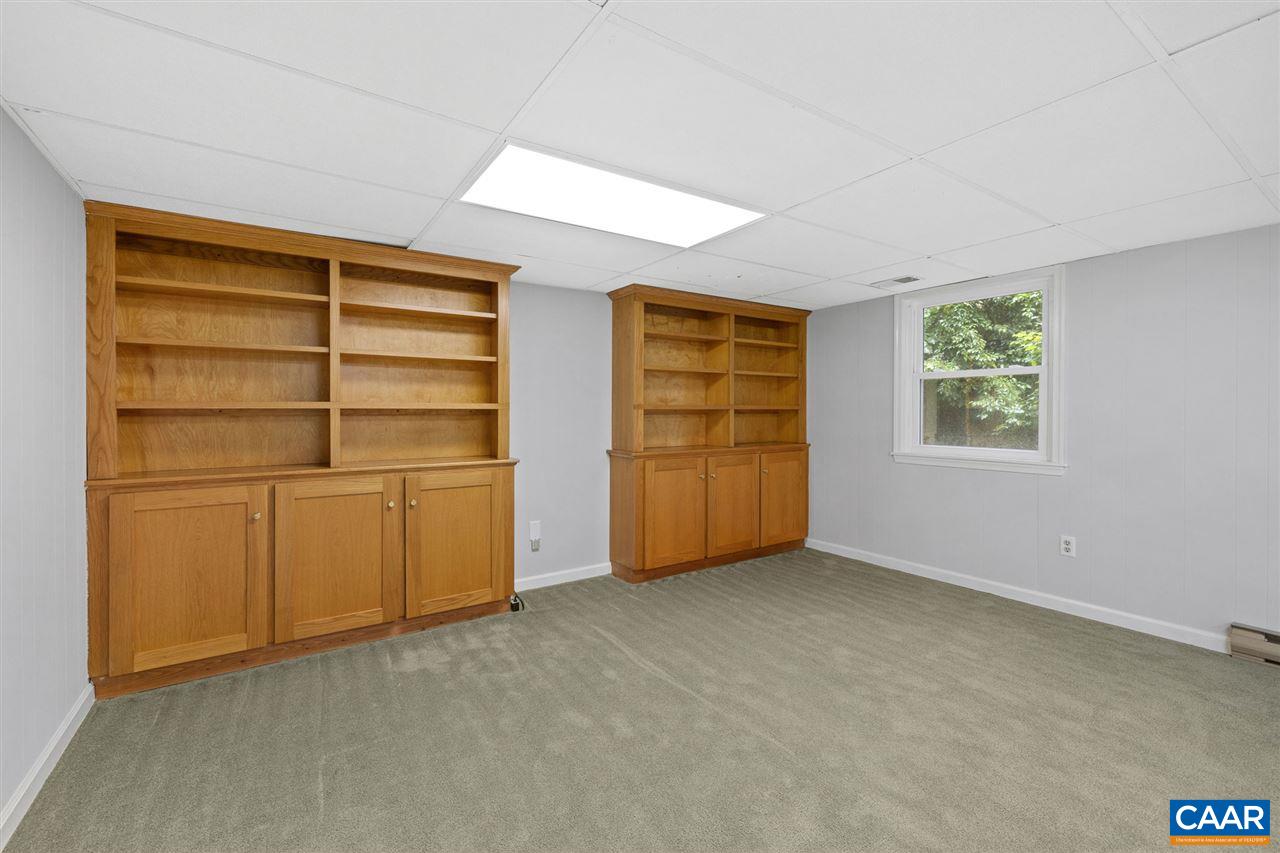 949 Chapman Road Stanardsville, VA 22973 - Photo 24 of 41 a view of an empty room with a fireplace
