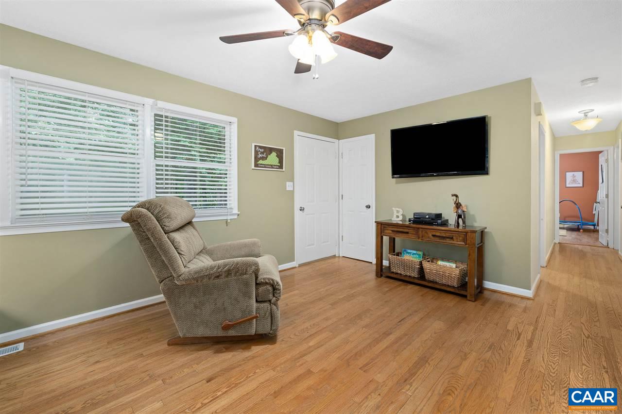 949 Chapman Road Stanardsville, VA 22973 - Photo 5 of 41 a living room with furniture and a flat screen tv