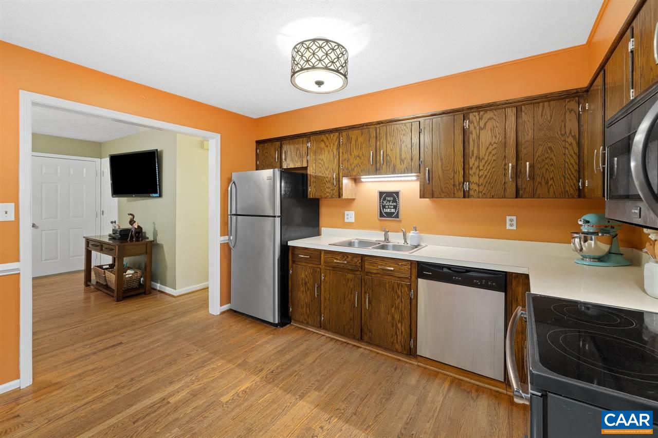 949 Chapman Road Stanardsville, VA 22973 - Photo 8 of 41 a kitchen with refrigerator cabinets and a sink
