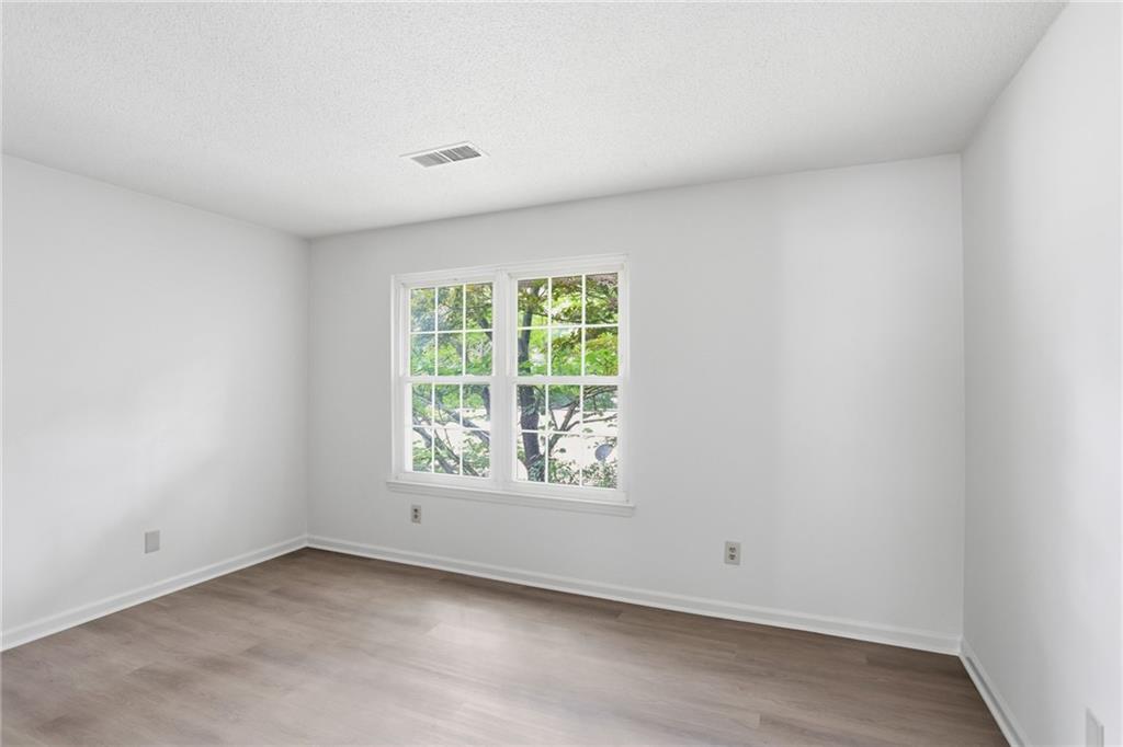 413 Promenade Court Marietta, GA 30064 - Photo 18 of 28 an empty room with a window