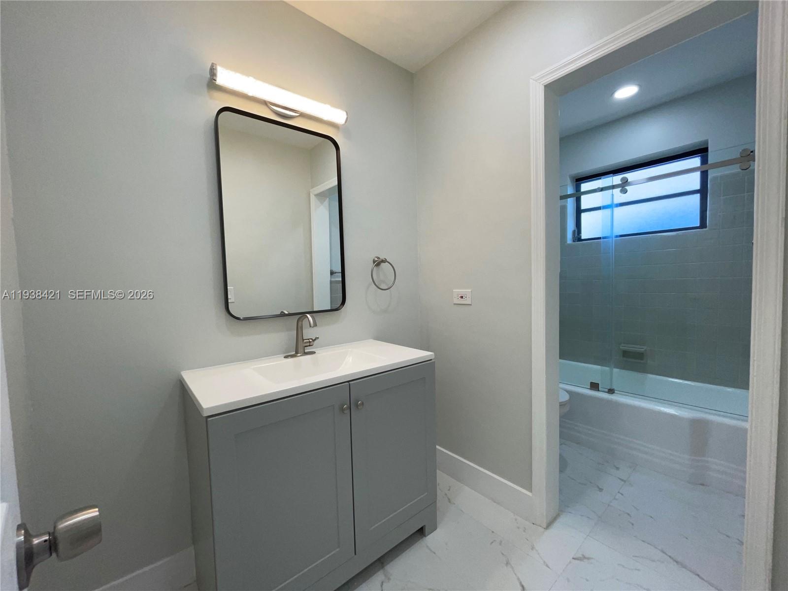 740 Northeast 181st Street Miami, FL 33162 - Photo 16 of 19 Second Bathroom