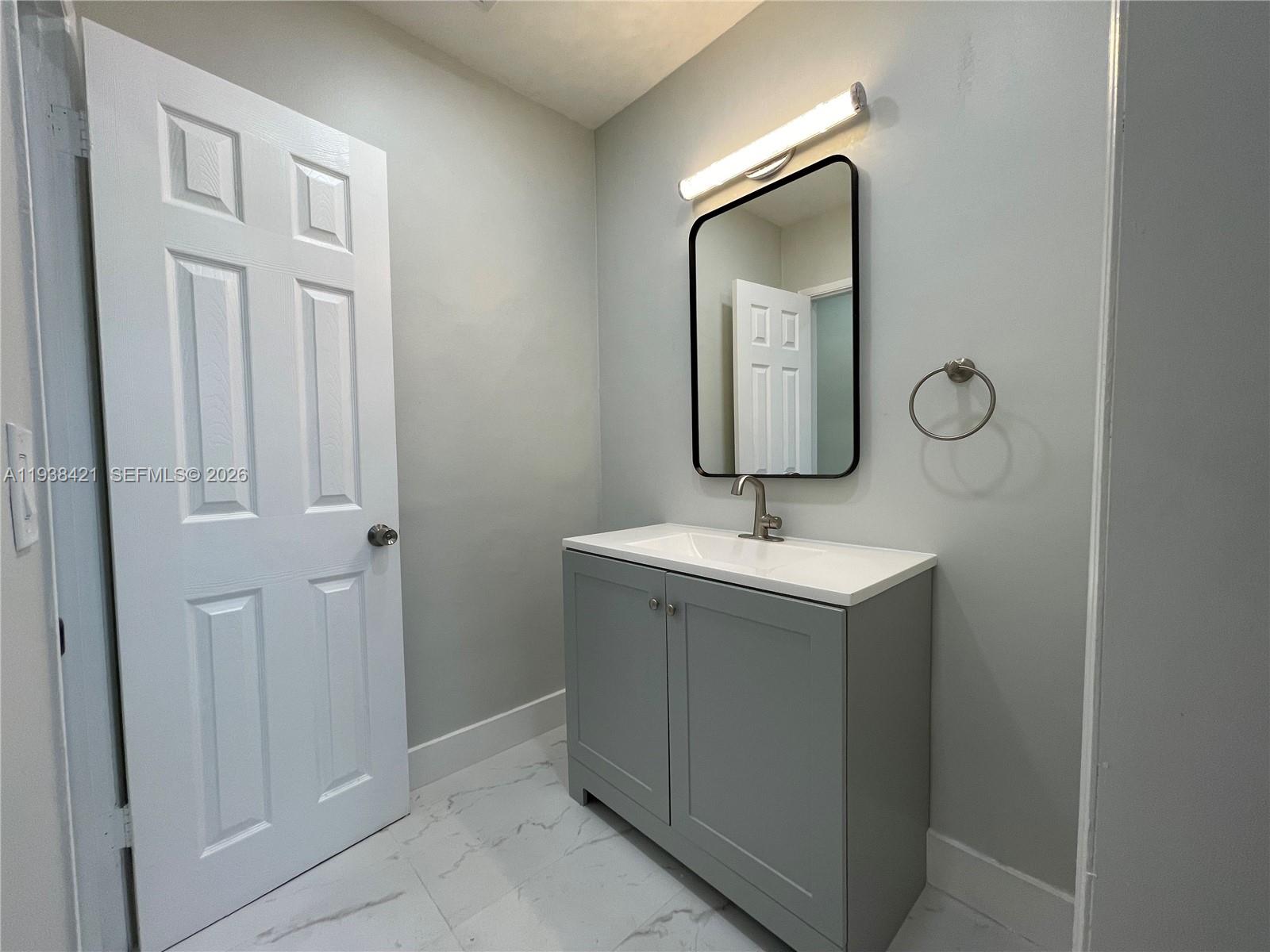 740 Northeast 181st Street Miami, FL 33162 - Photo 18 of 19 Second Bathrrom