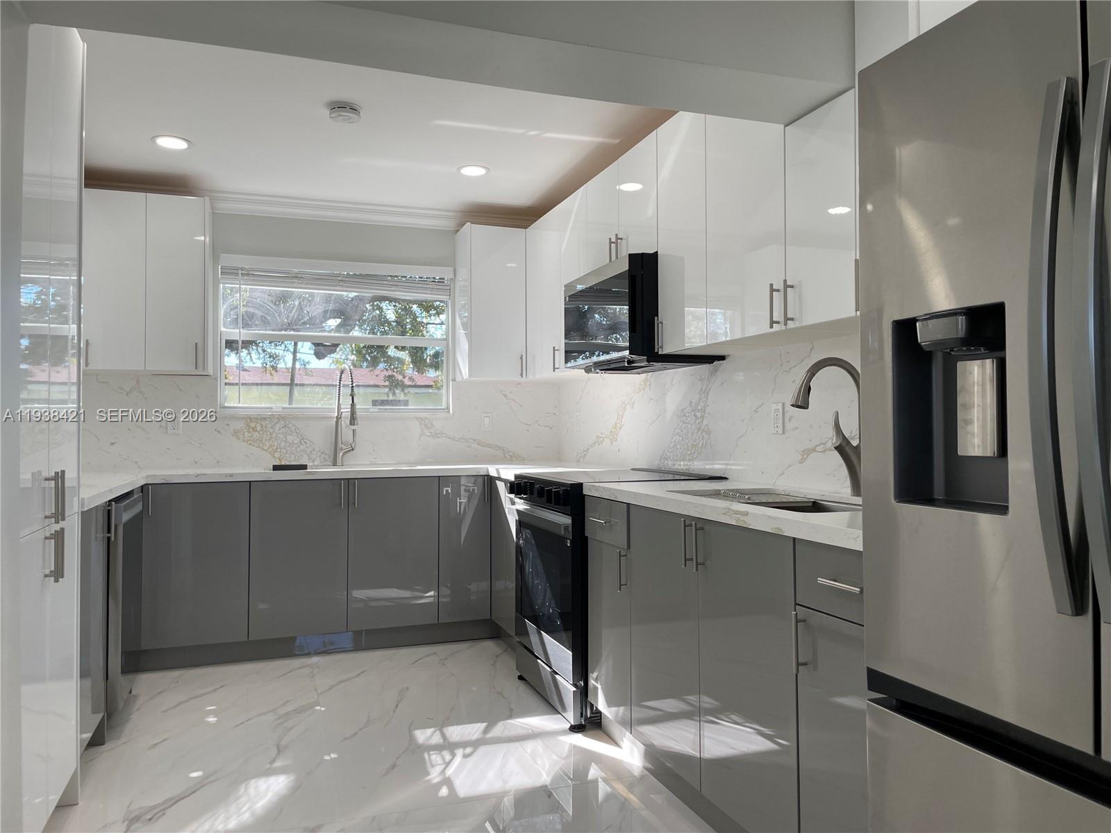 740 Northeast 181st Street Miami, FL 33162 - Photo 3 of 19 Double Sink Featured